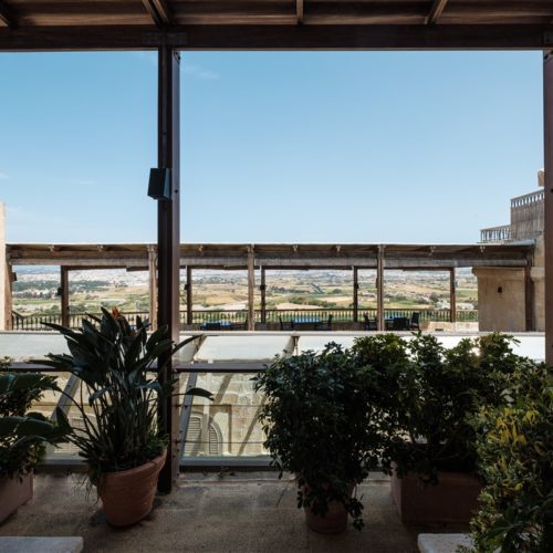 The green porch leading to the Deluxe Room with Panoramic Porch in the renovated seventeenth century palazzo in Mdina housing The Xara Palace 5 Star Boutique Hotel in Mdina, Malta