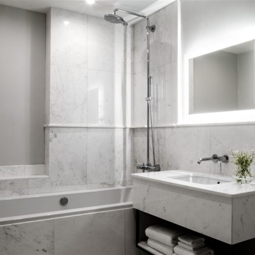 Luxurious White Marble Bathroom the Deluxe Suite with Terrace and Jacuzzi in the renovated 17th Century Palazzo that is The Xara Palace Relais and Chateaux located within the bastions of the Medieval City of Mdina Malta