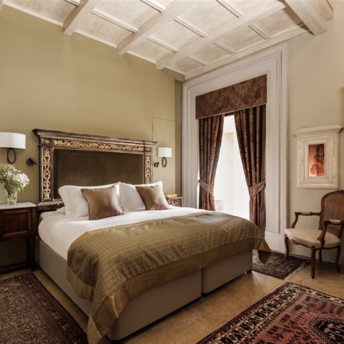 The bedroom the Executive Duplex Suite with Terrace and Jacuzzi in The Xara Palace Relais & Chateaux, a luxury Boutique Hotel situated in a renovated palazzo in the medieval city of Mdina Malta